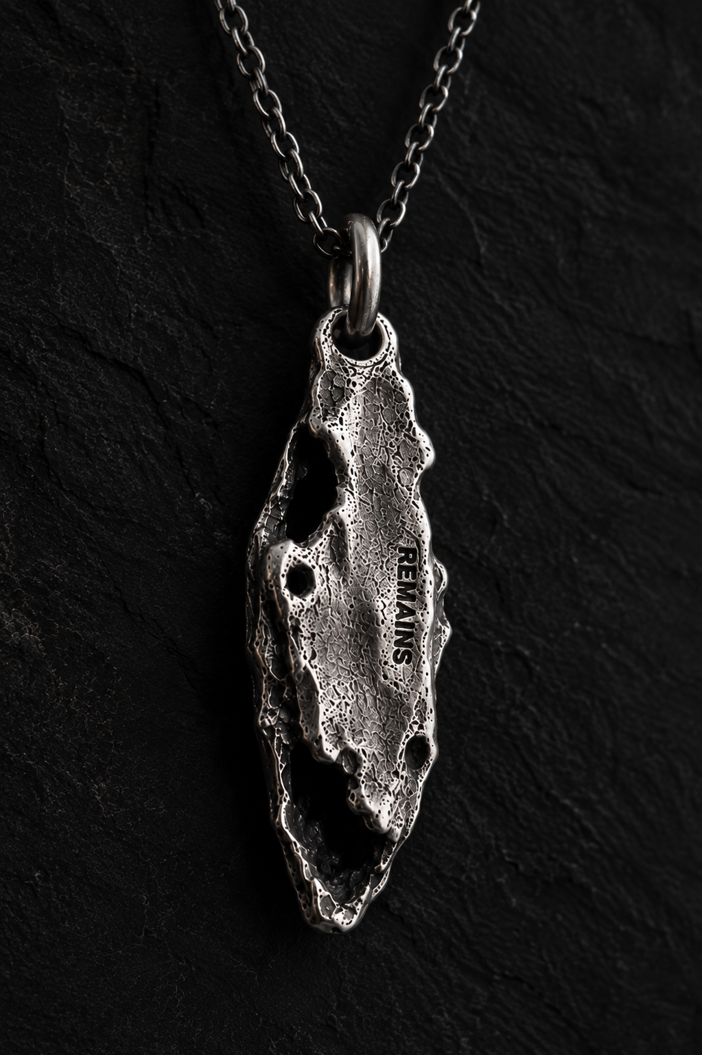 OBJECT 003 — REMAINS PENDANT