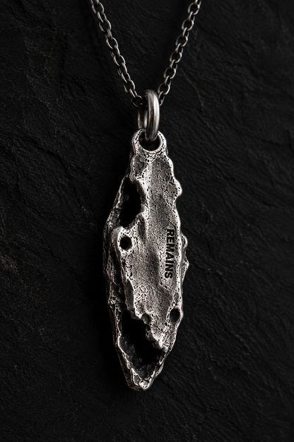 OBJECT 003 — REMAINS PENDANT